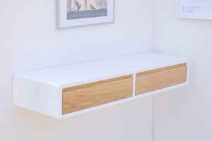 White painted floating desk for home office with oak drawers